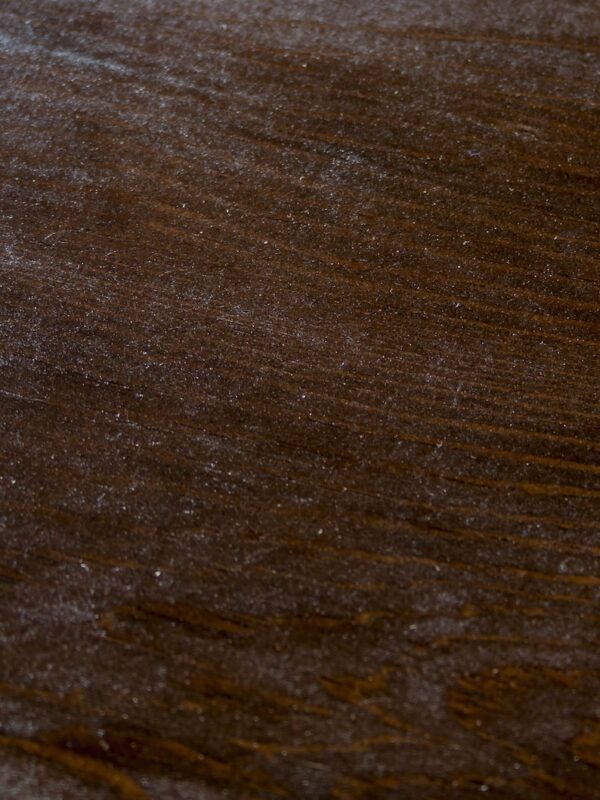 A close up of the wood grain on a table.