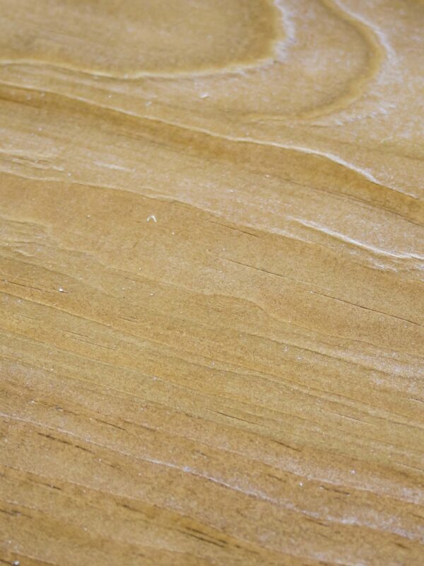 A close up of the wood grain on a surface