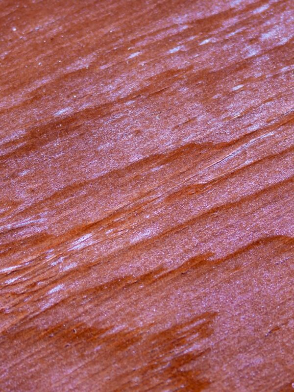 A close up of the wood grain on a surface