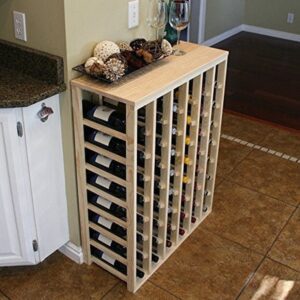 A wine rack with many bottles of wine on top