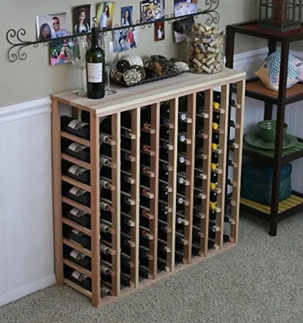 A wine rack with bottles of wine on top.