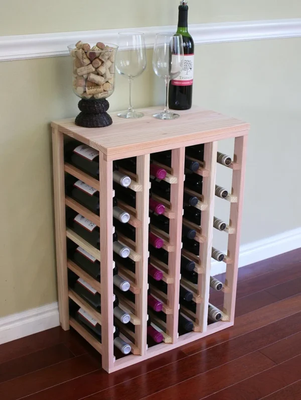 A wine rack with many bottles of wine on it