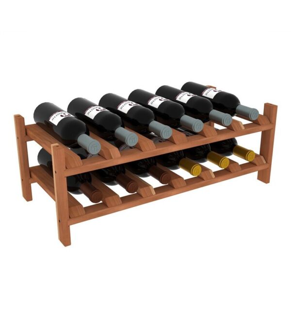 A wooden wine rack with bottles of wine on top.