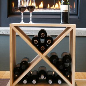 A wine rack with bottles of wine and two glasses.